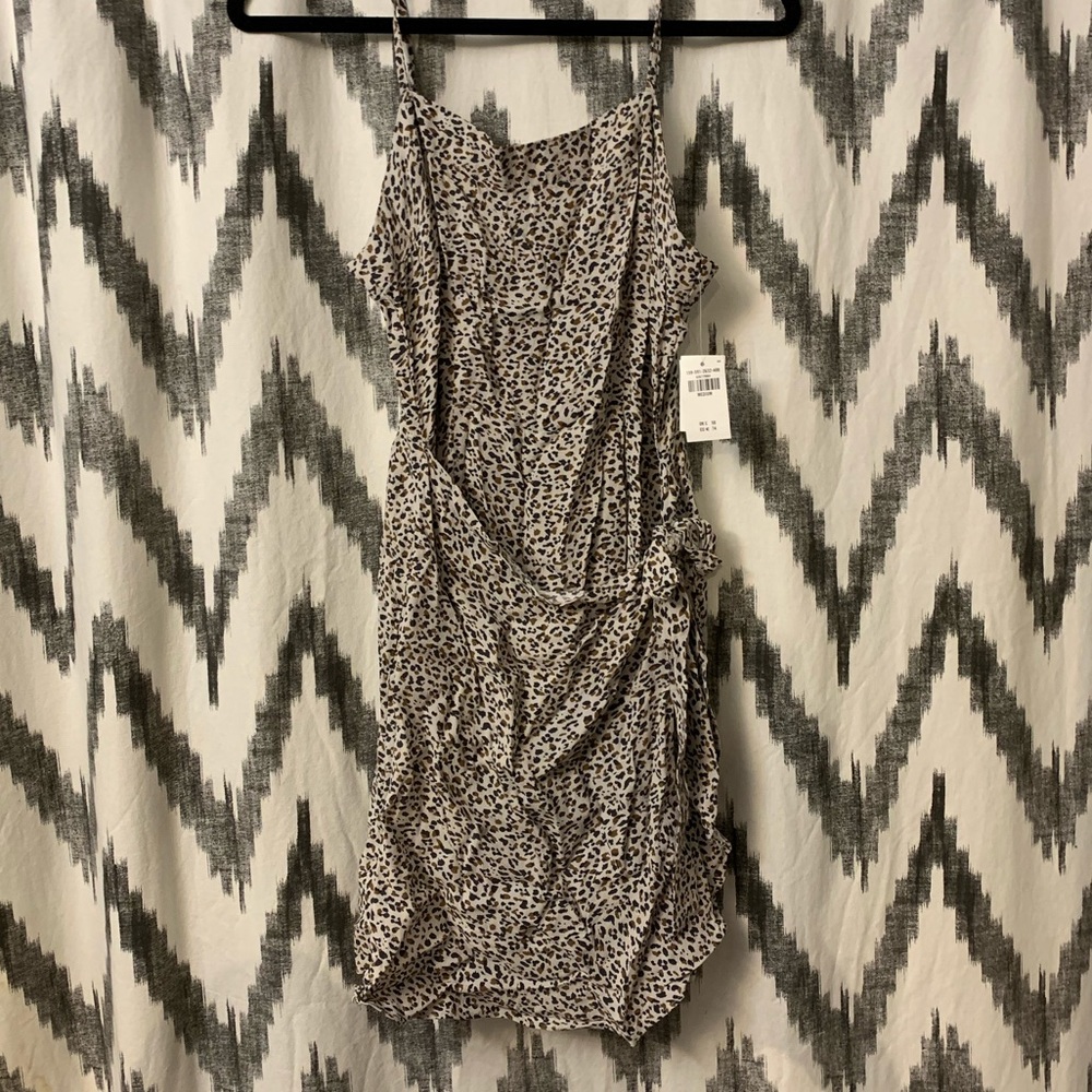 Leopard dress size med. new with tag. Wrap dress